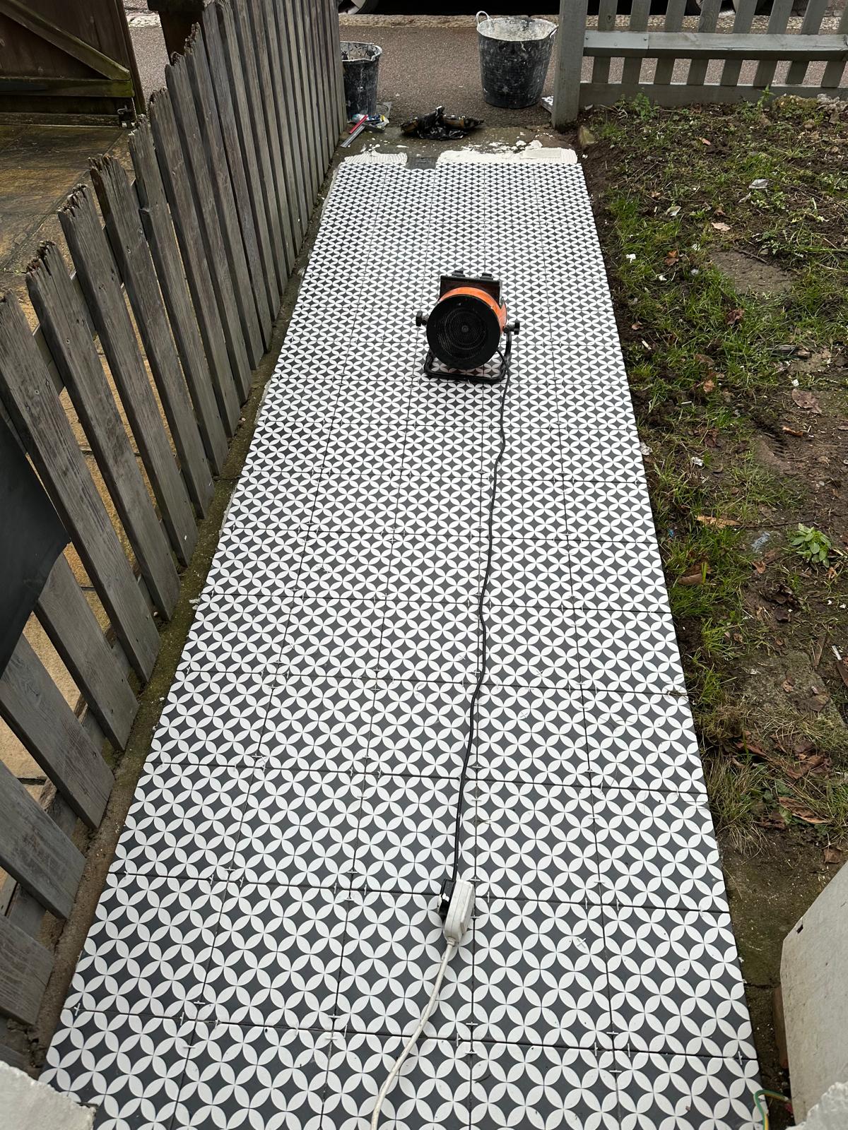 Garden path tiles in East London